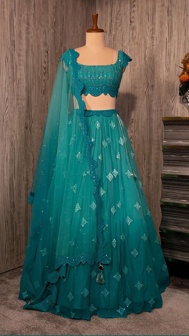 PEACOCK BLUISH GREEN LEHENGA SET